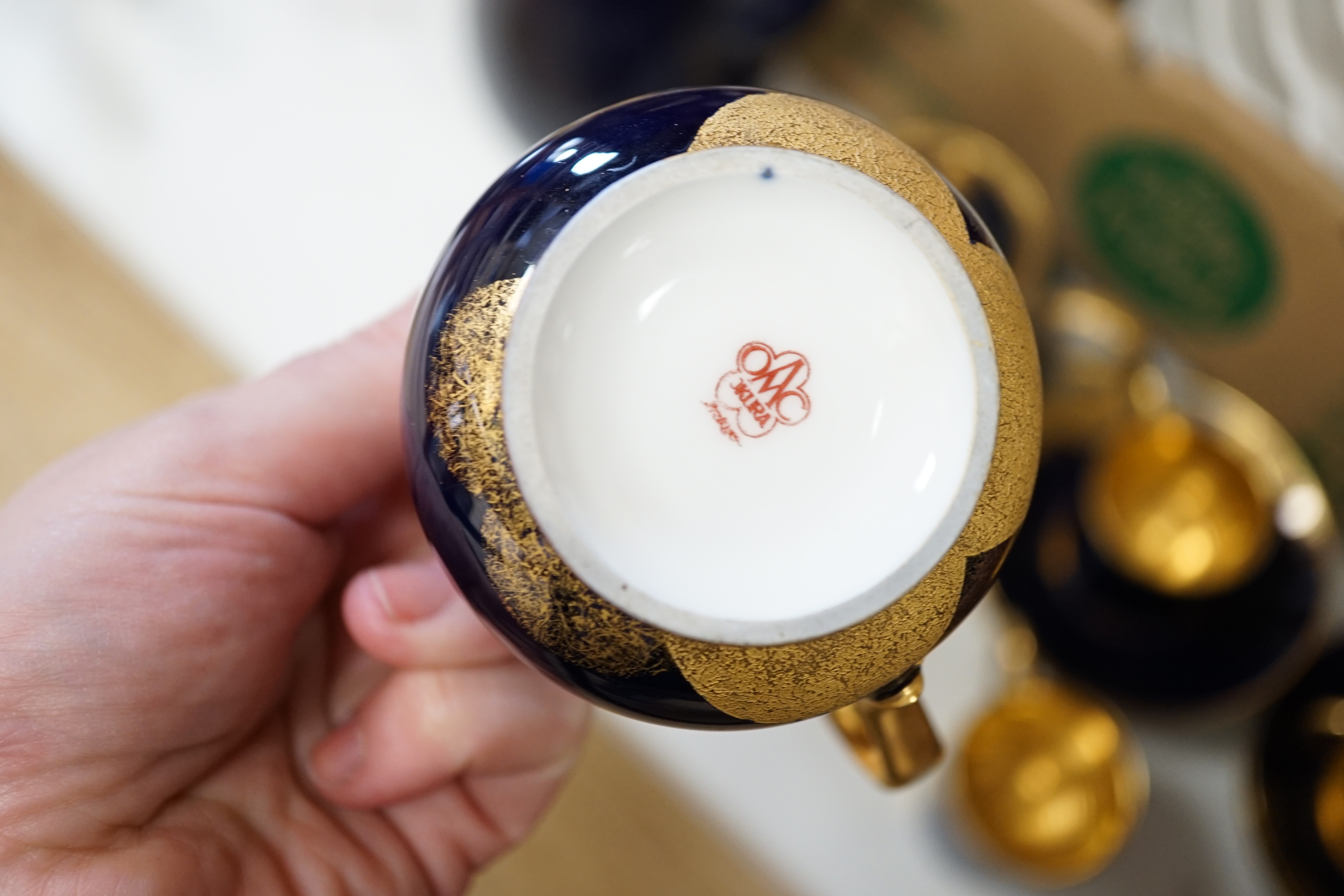 A collection of various china including Belleek cup and saucer, a Worcester cup and saucer and a set of eight circular dishes, largest 25cm in diameter